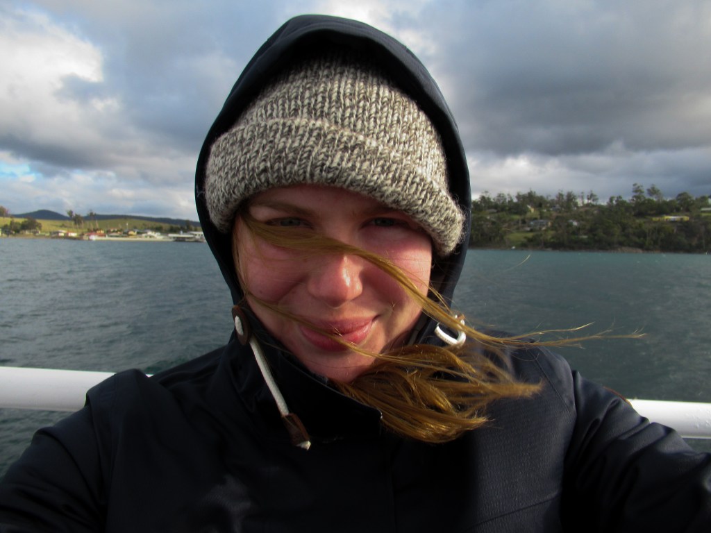 Portrait of a blonde woman (sapphire) in winter gear